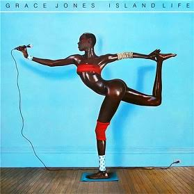 The Island Life album cover: Grace Jones in a flat-top, contorted into an impossible backbend against a blue ground, wearing a red swimsuit.