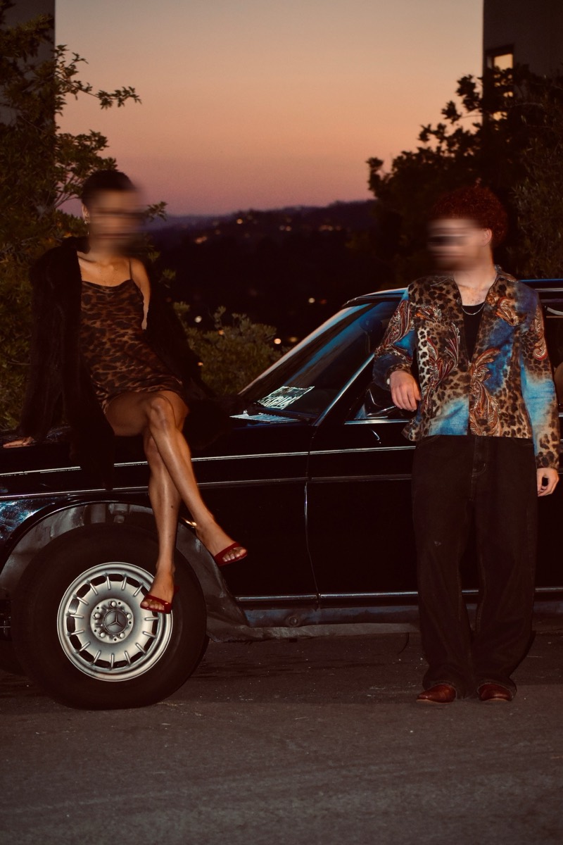 Dusk portrait, both straight to camera, faces motion-blurred