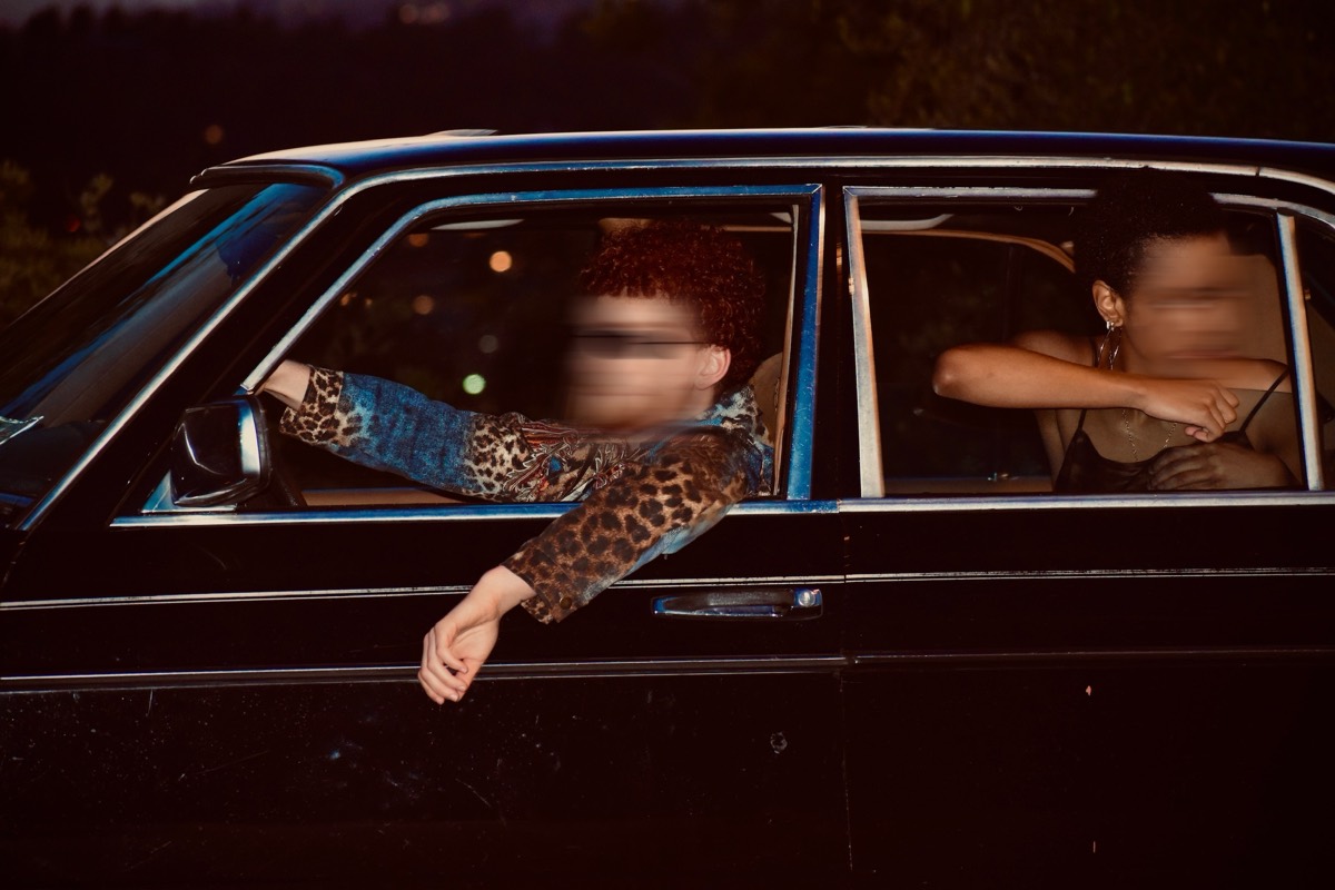 Night, she rides in the back seat