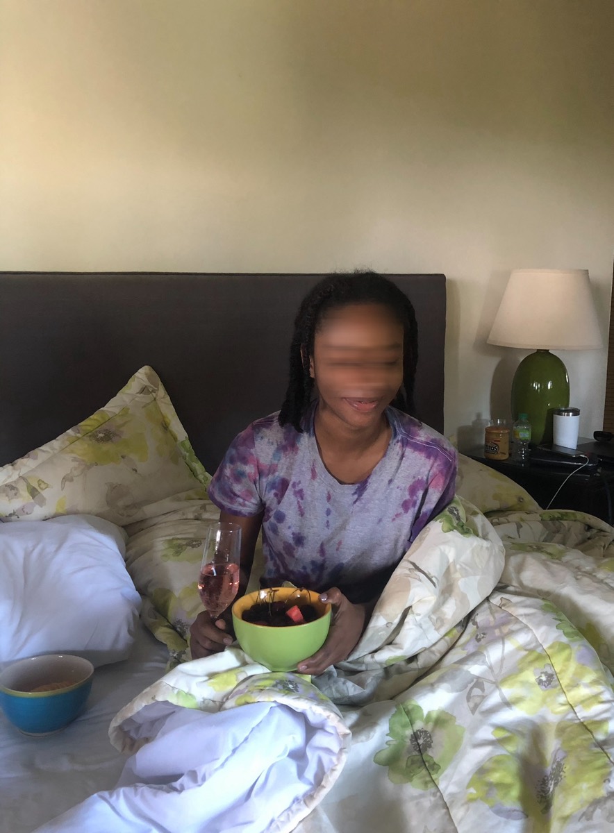 The last frame, alone in bed with a fruit bowl